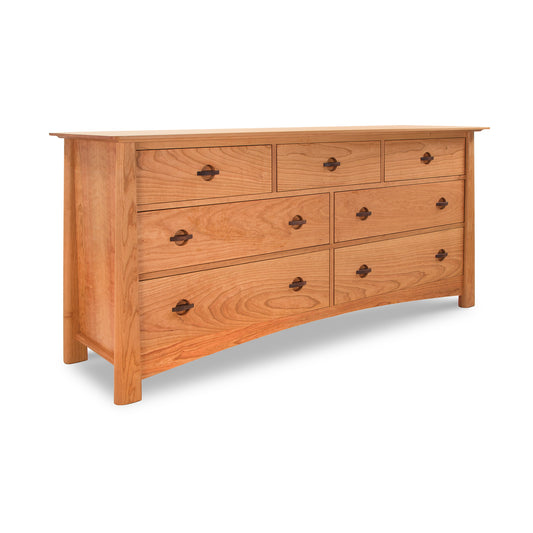 An eco-friendly Maple Corner Woodworks Cherry Moon 7-Drawer Dresser with multiple drawers and round handles, isolated on a white background.
