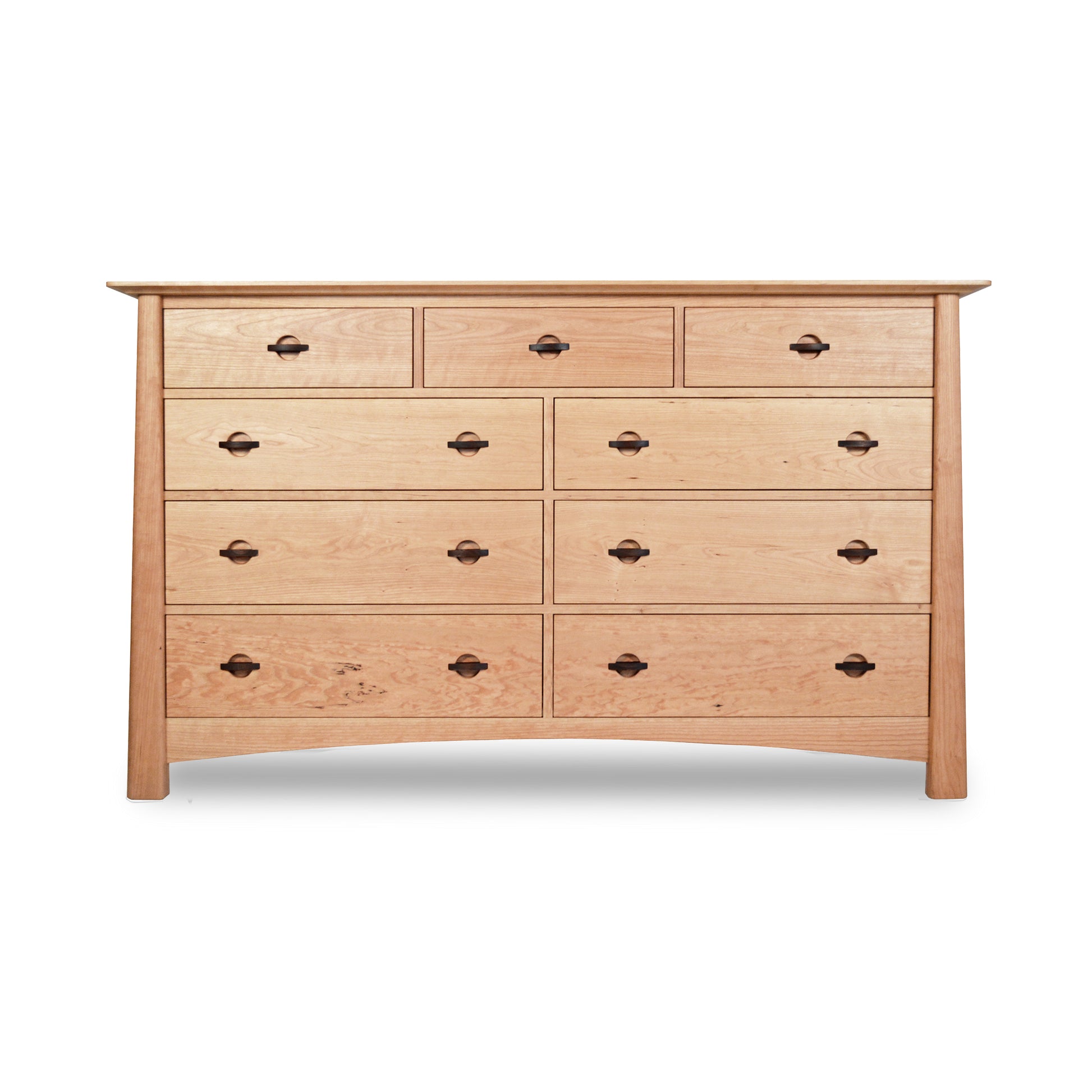 A Maple Corner Woodworks Cherry Moon 9-Drawer Dresser, with nine drawers, featuring a larger size for the bottom row and smaller ones above, all with round metal handles, set against a white background.