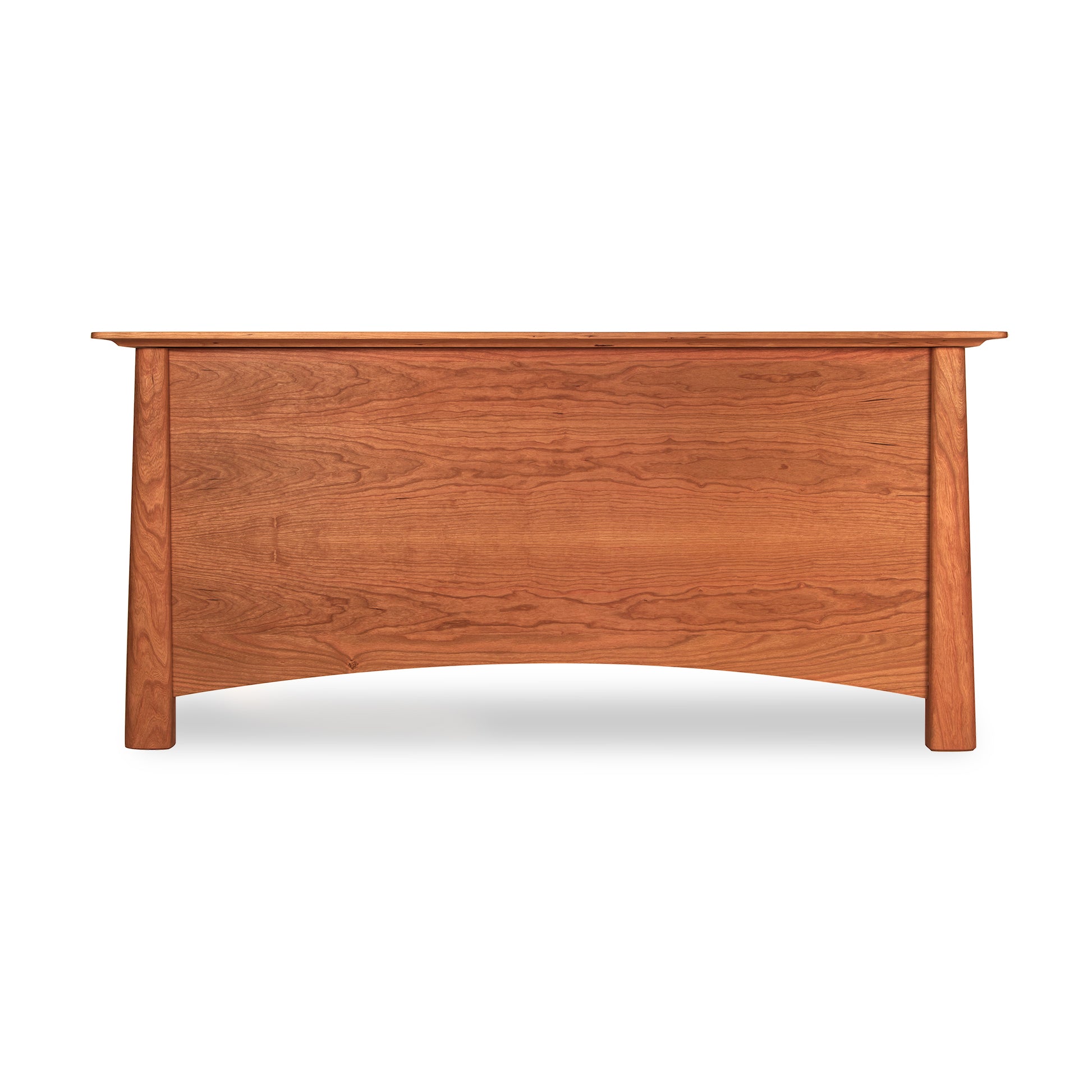 Cherry Moon Blanket Chest with curved front panel and tapered legs, crafted from light brown American hardwoods by Maple Corner Woodworks.