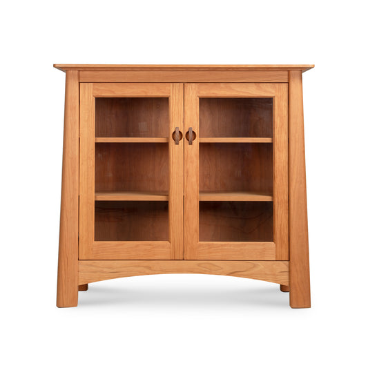 Cherry Moon Bookcase with Glass Doors by Maple Corner Woodworks, handmade in Vermont, features two interior shelves and fine cherry wood craftsmanship.