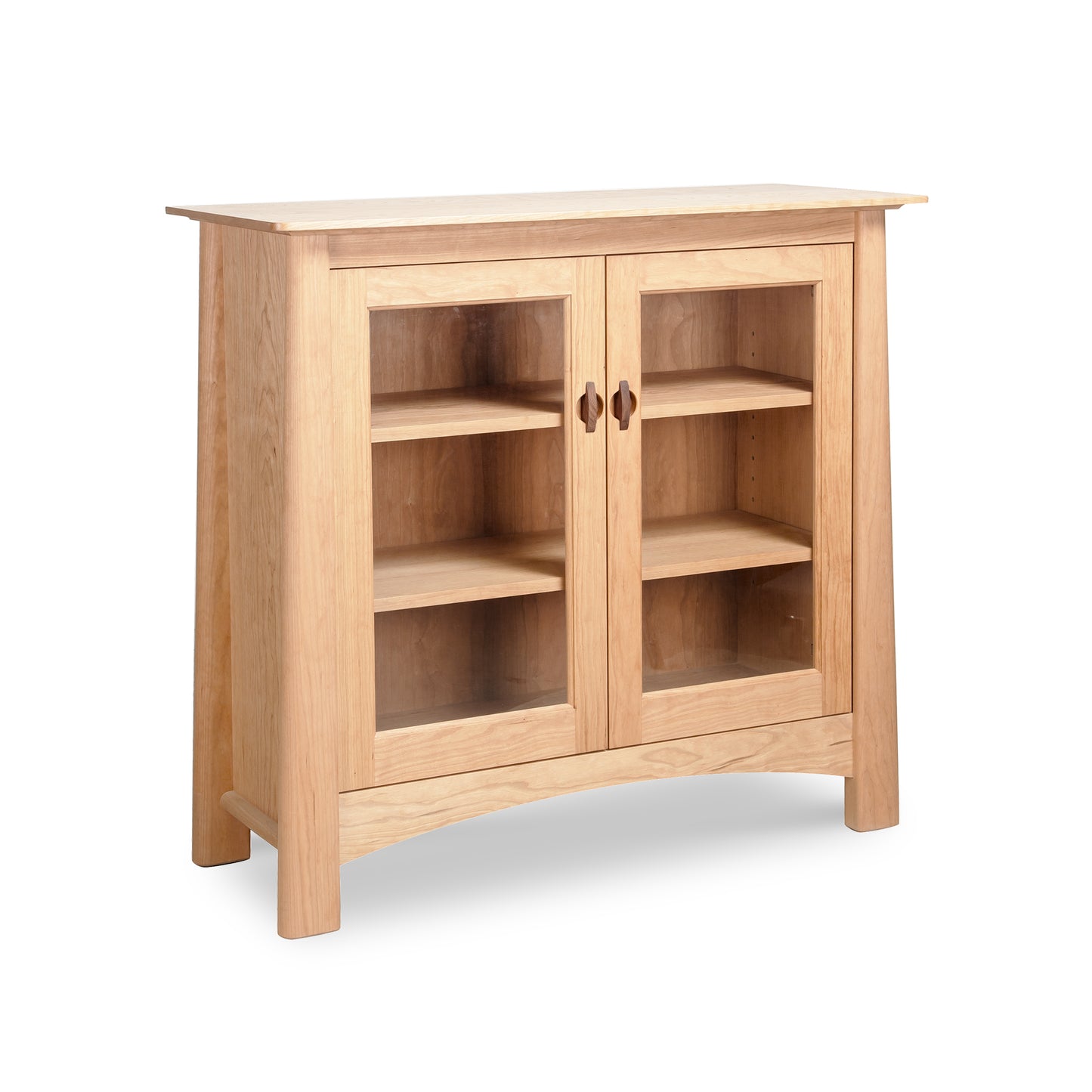 Cherry Moon Bookcase by Maple Corner Woodworks with glass doors, three shelves, and metal handles, made from sustainable American hardwood.