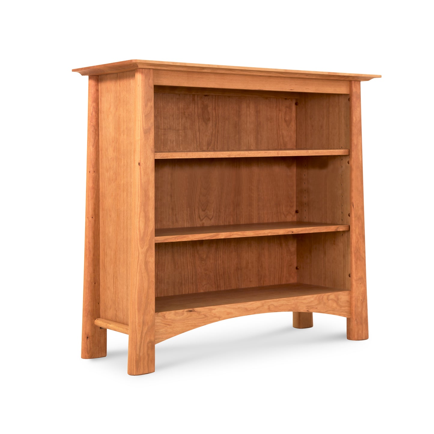 Cherry Moon Bookcase by Maple Corner Woodworks showcasing three shelves and a distinctive curved bottom, crafted from sustainably harvested hardwoods with a smooth white finish.