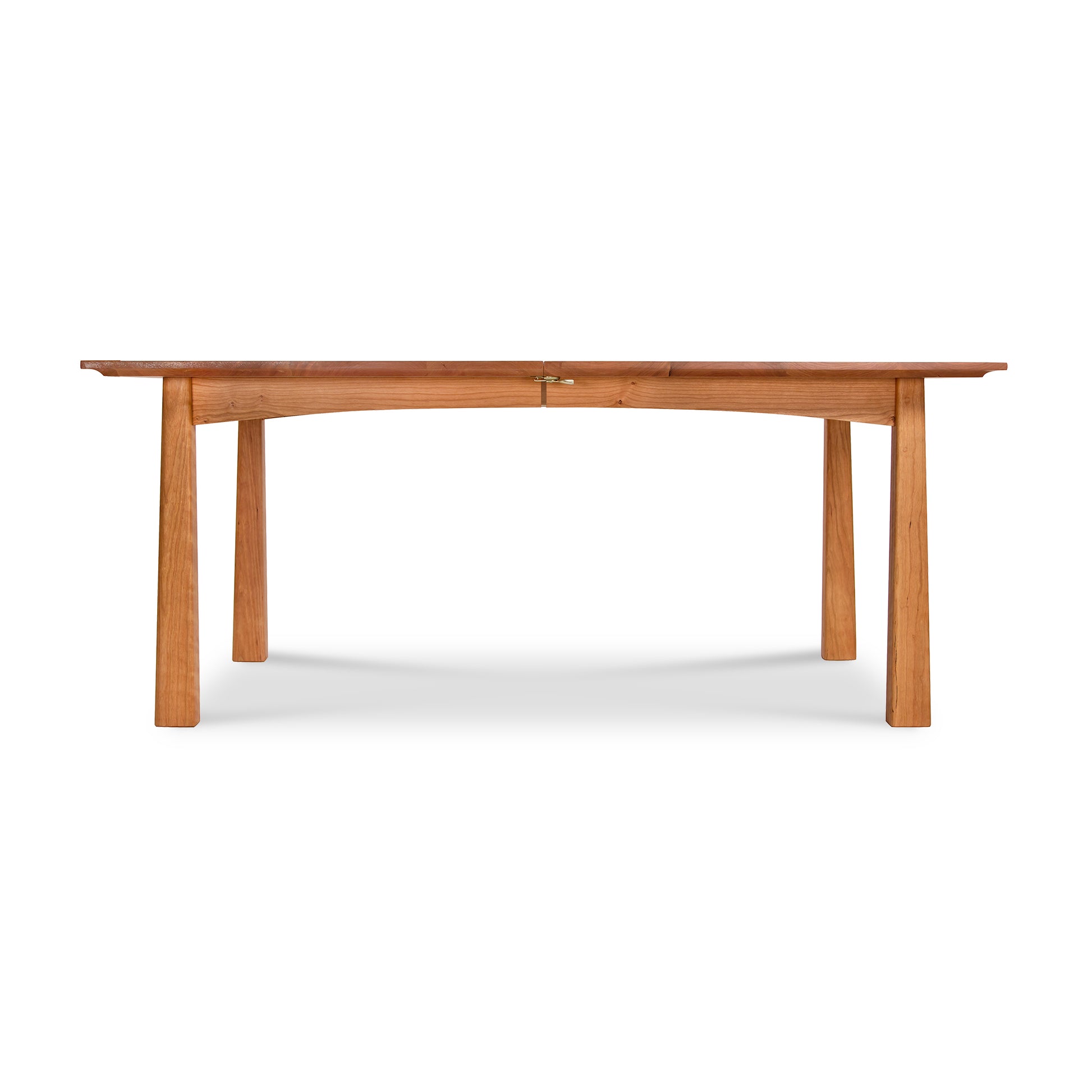 Cherry Moon Extension Dining Table with a rectangular top and four robust legs, crafted in the Arts & Crafts style from solid natural wood.