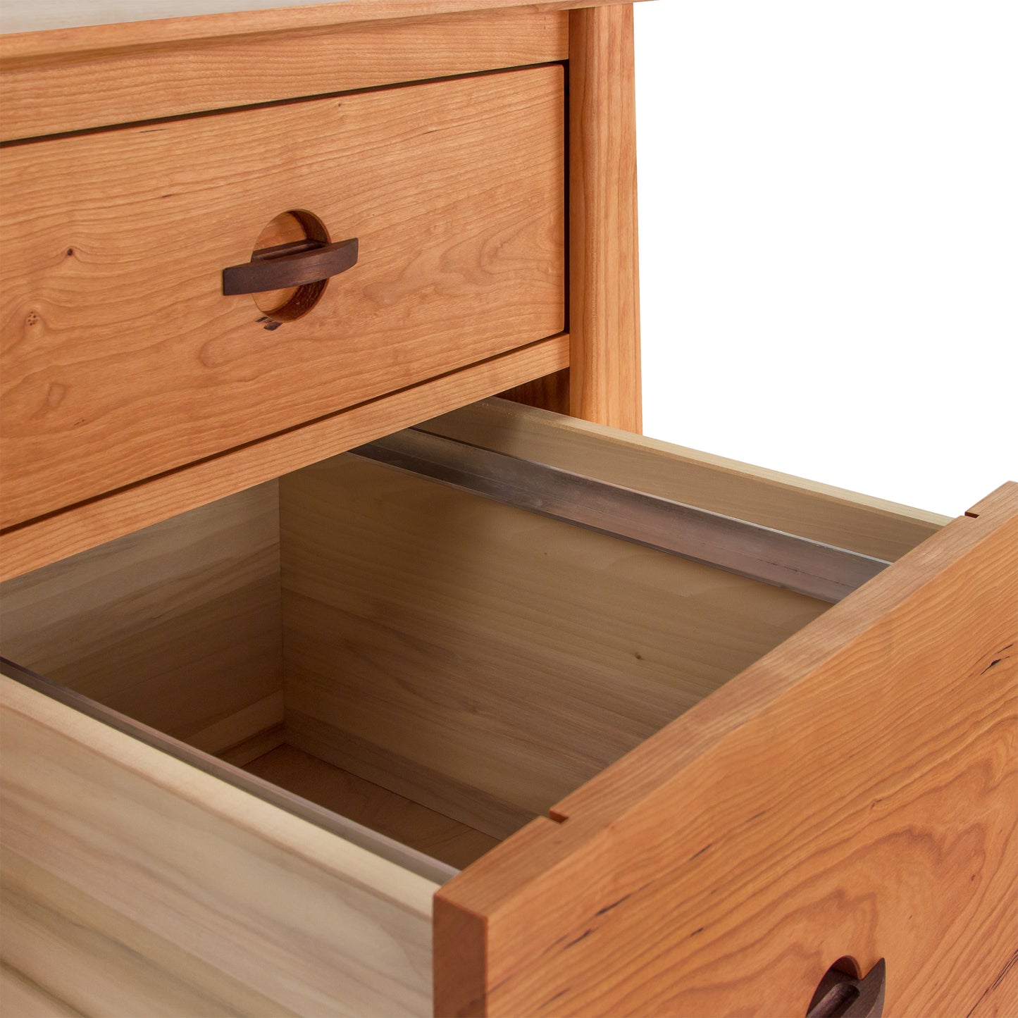 Cherry Moon File Cabinet by Maple Corner Woodworks with solid wood craftsmanship, featuring metal runners and circular handles, two drawers shown—one open, one closed.