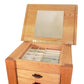 An open Maple Corner Woodworks Cherry Moon Jewelry Cabinet with multiple compartments and a mirror on the inside of the lid.