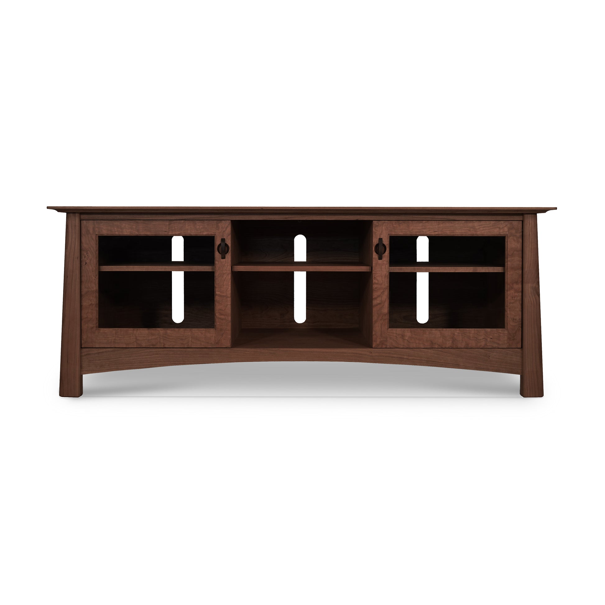 A Maple Corner Woodworks Cherry Moon 68" TV Console with a curved front, featuring three open shelves and additional storage space behind glass doors. The Cherry Moon TV Console is made of dark-stained wood and has a glossy finish.