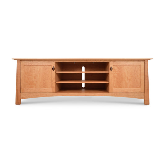 Cherry Moon 80" TV-Media Console featuring an elegant curved base, two side cabinets, and three central open shelves, crafted from light-colored wood as part of the Cherry Moon Furniture Collection by Maple Corner Woodworks.
