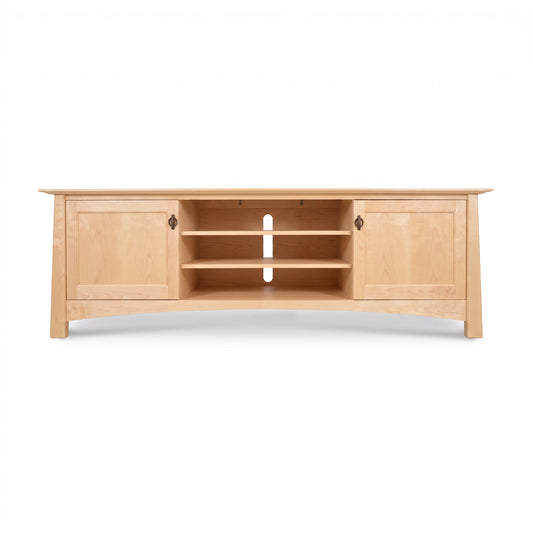 Cherry Moon 80″ TV-media console by Maple Corner Woodworks in light cherry wood with two cabinets, open shelves, and cable management hole.