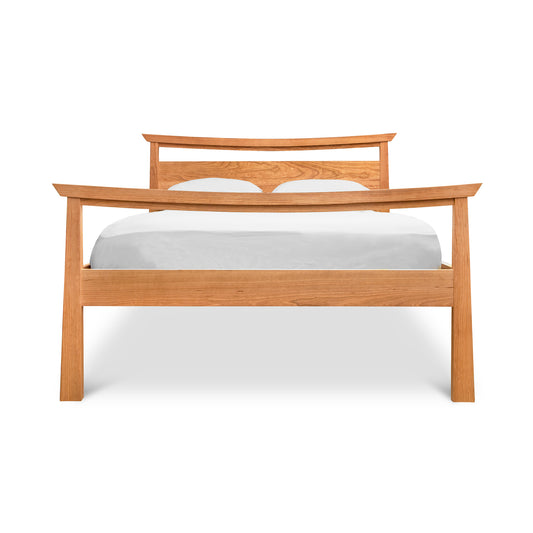 Maple Corner Woodworks Cherry Moon Pagoda Bed featuring elegant curved headboard and footboard in cherry wood.
