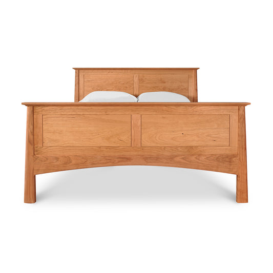 Cherry Moon Panel Bed by Maple Corner Woodworks showcasing a tall headboard, matching footboard, and natural cherry wood finish.