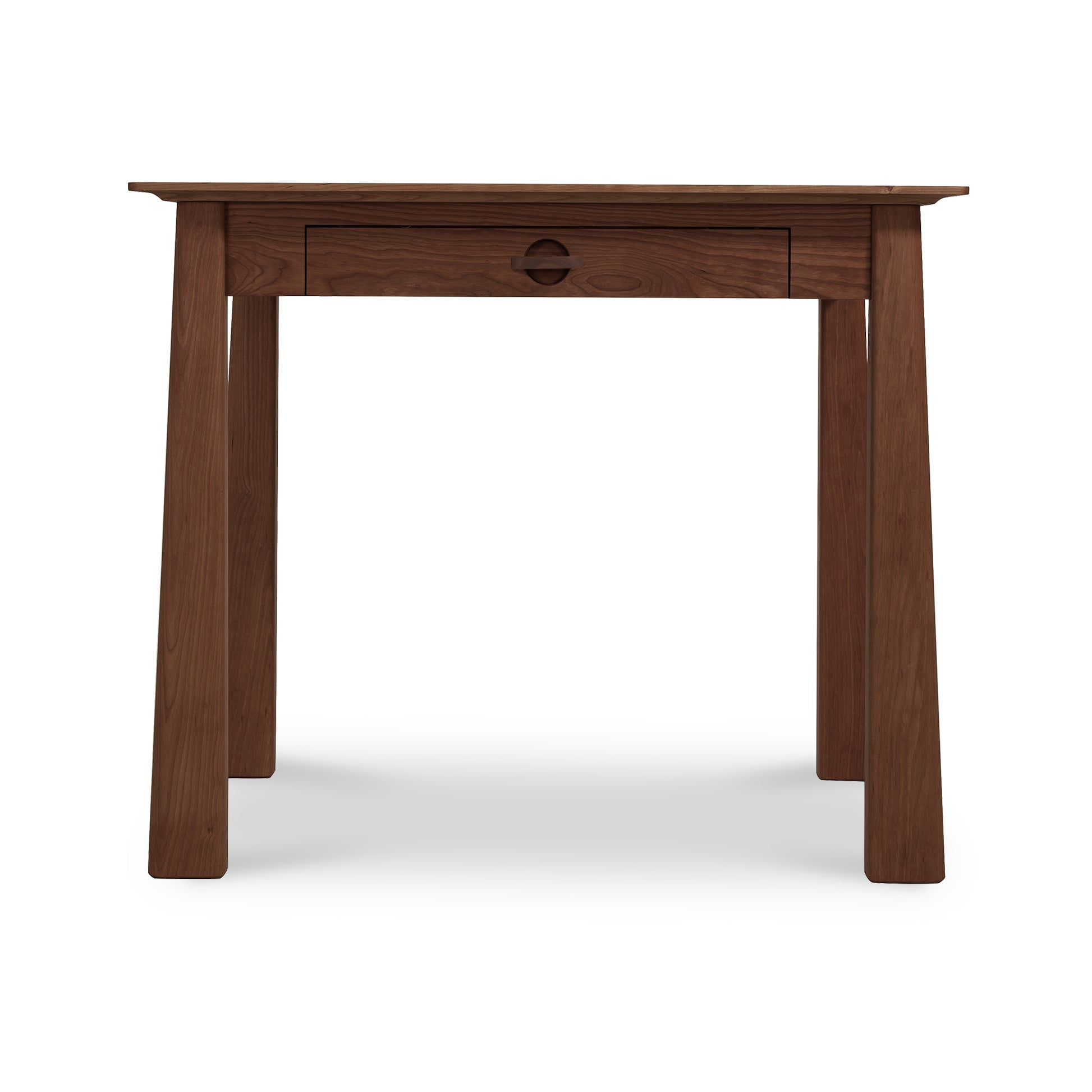 Cherry Moon Writing Desk by Maple Corner Woodworks, crafted from solid cherry wood with a single center drawer and circular pull handle, showcasing straight legs and a smooth finish.
