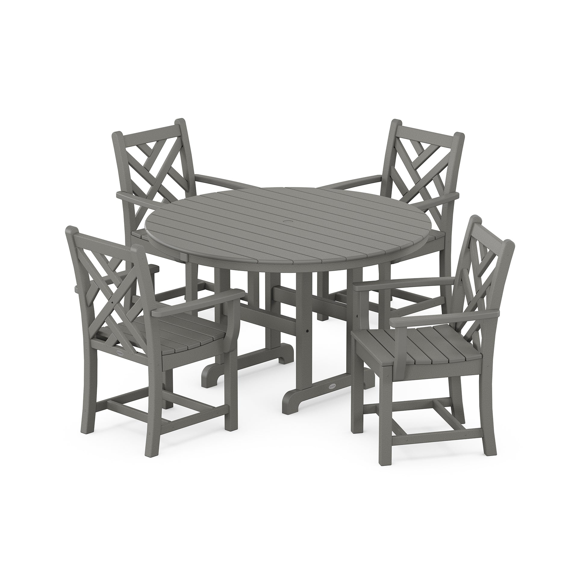 POLYWOOD Chippendale 5-Piece Dining Set featuring a round gray patio table with four lattice-back chairs made from recycled lumber.