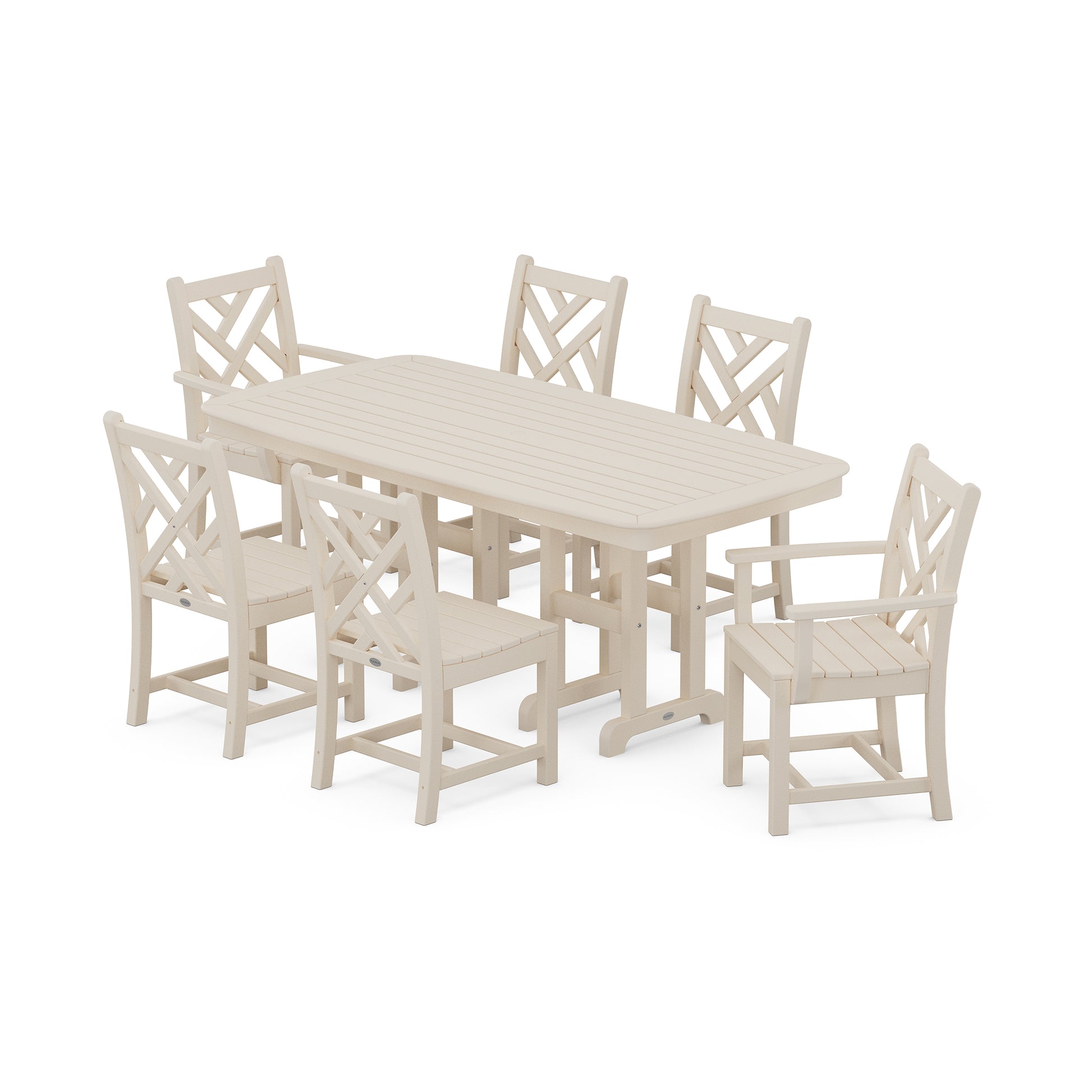 A light beige outdoor dining set consisting of a rectangular table and six chairs with x-back design, isolated on a white background. The POLYWOOD Chippendale 7-Piece Dining Set appears sturdy and is made of recycled lumber or synthetic material.