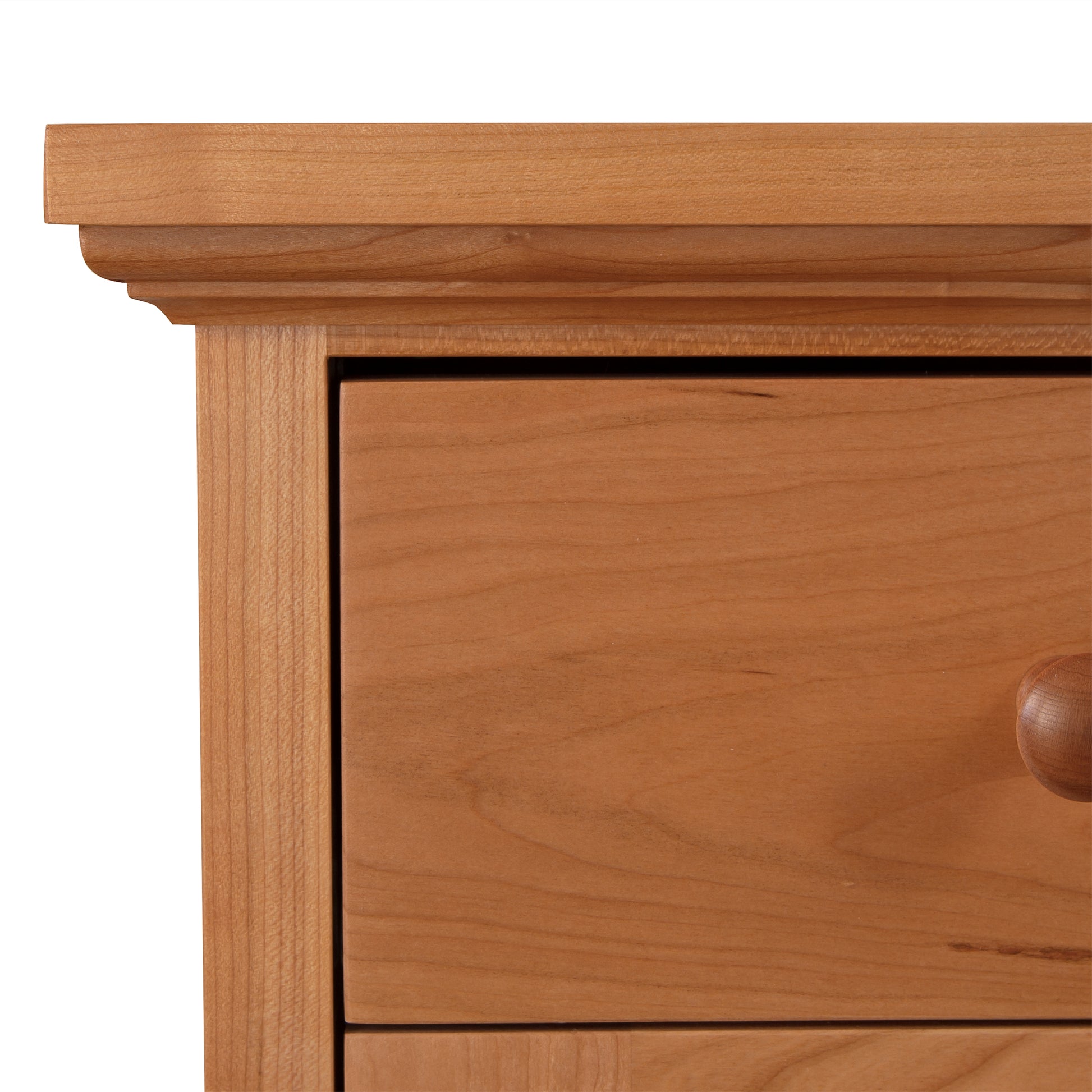 Classic Country Buffet by Lyndon Furniture showcasing exquisite Vermont craftsmanship, featuring a light brown wood grain and a round knob.