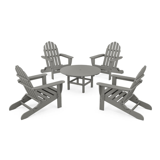 POLYWOOD Classic Folding Adirondack 5-Piece Set with four gray chairs and matching table crafted from recycled lumber.