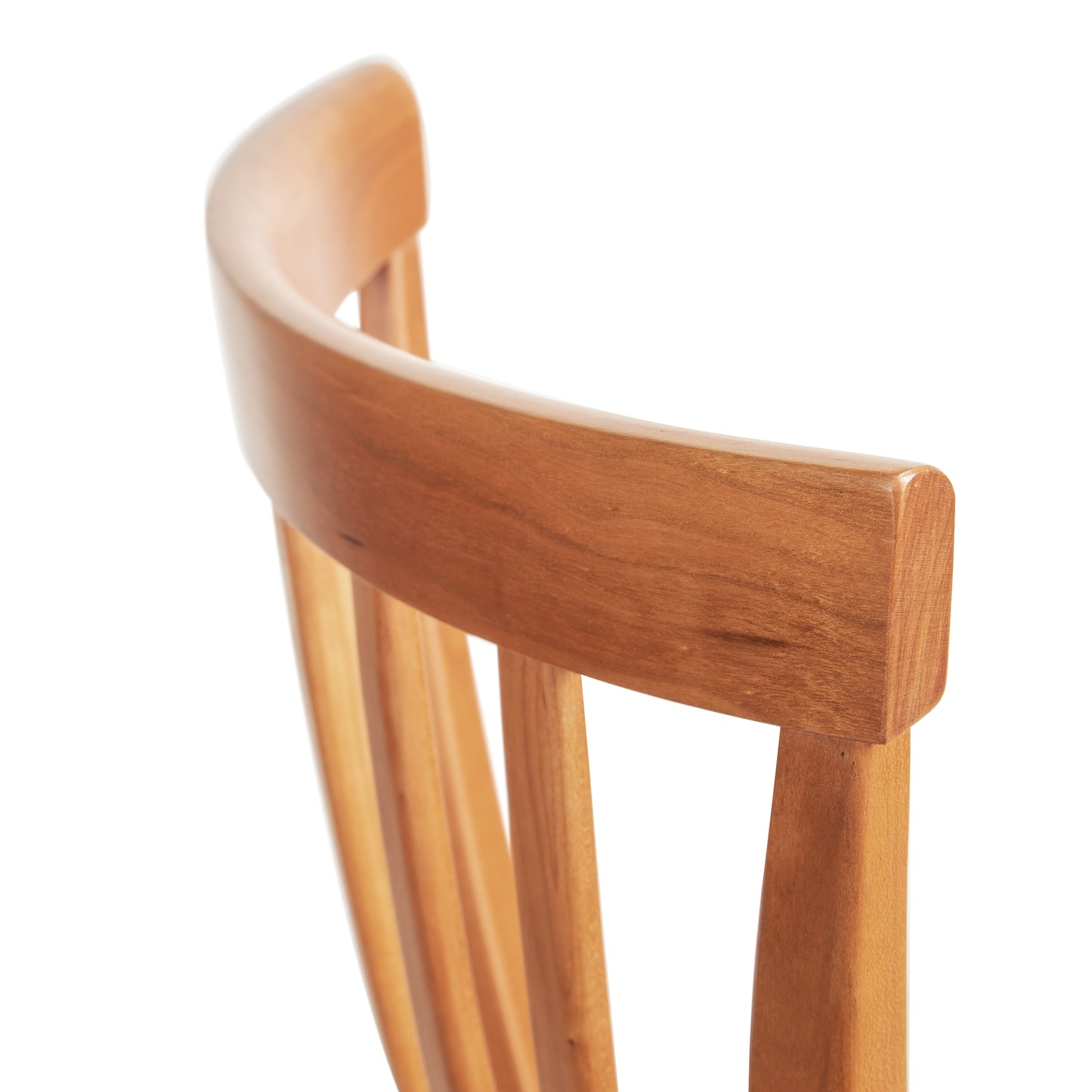 Lyndon Furniture Classic Shaker Chair #1, showcasing a curved backrest and vertical slats, highlighting its luxurious craftsmanship.