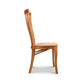 An American made Lyndon Furniture Classic Shaker Chair #1 with Scooped Wooden Chair - Floor Model with a padded seat is positioned against a white background.