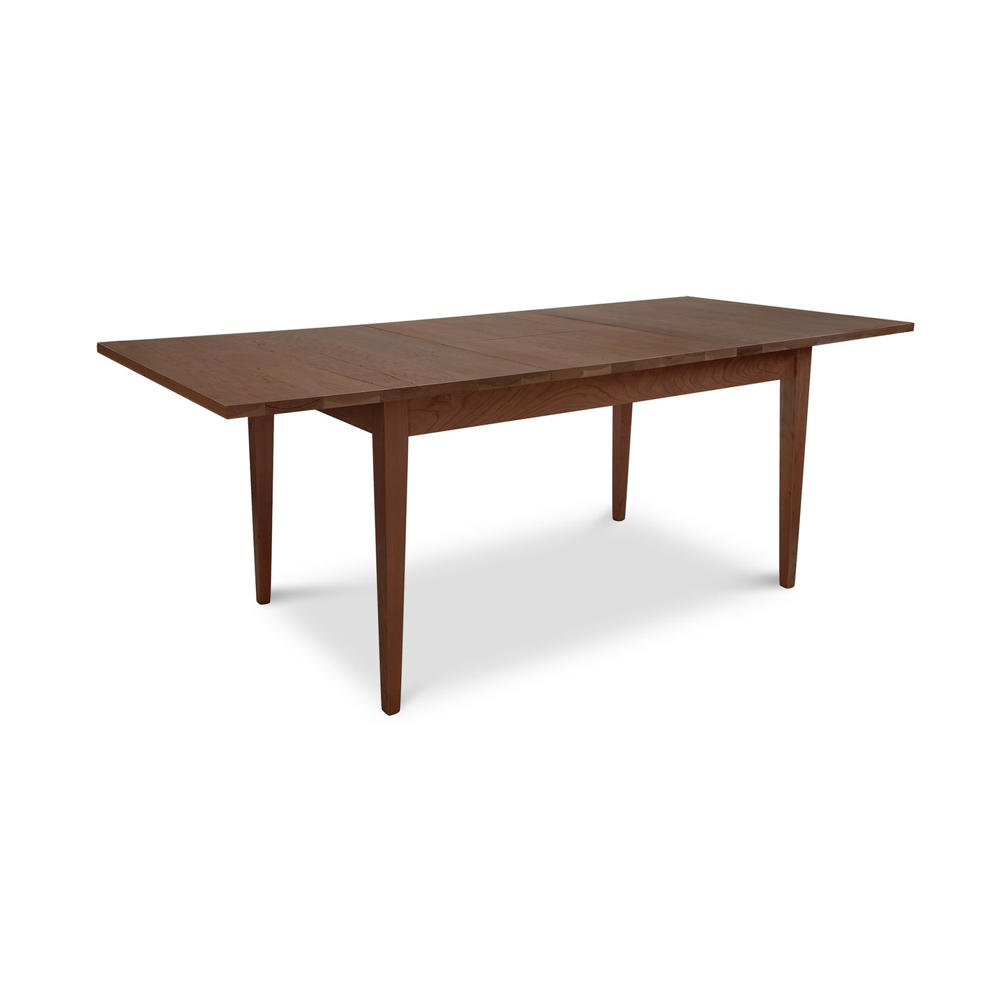 Classic Shaker Butterfly Extension Table by Lyndon Furniture crafted from solid, sustainably harvested wood, featuring four elegant tapered legs.