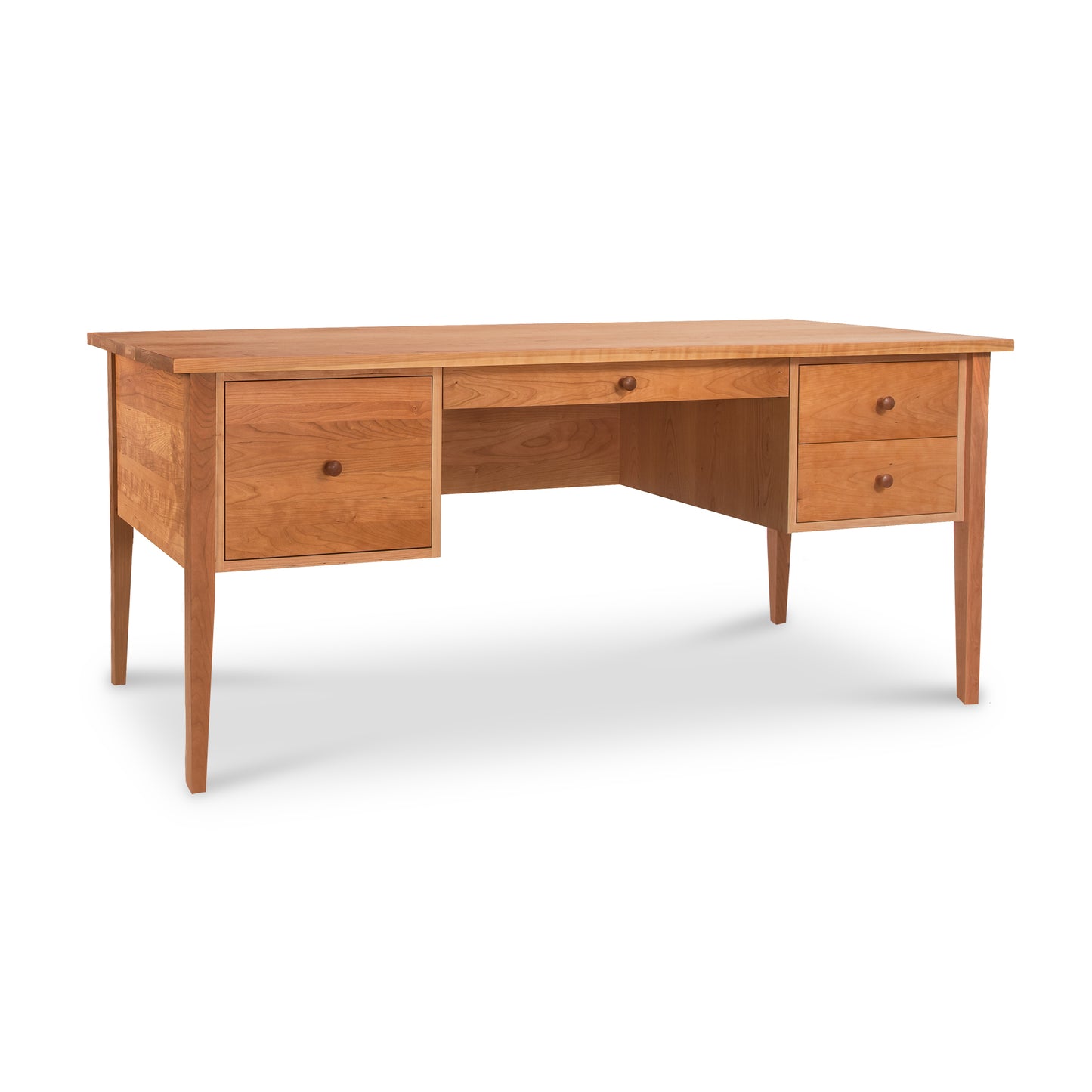Lyndon Furniture Large Wood Executive Desk with four drawers and tapered legs, expertly crafted from sustainably harvested wood.