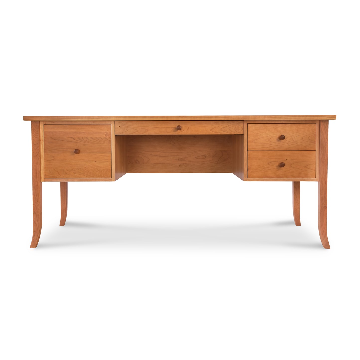 Lyndon Furniture Large Wood Flare Leg Executive Desk with three drawers and distinctive curved legs, showcasing its craftsmanship.