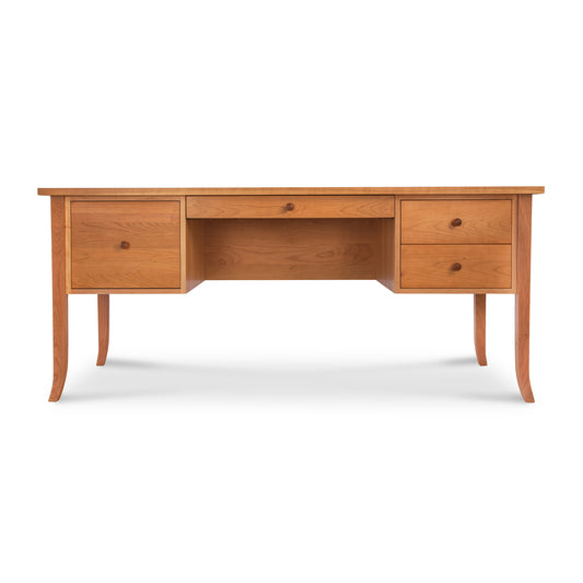 Lyndon Furniture Large Wood Flare Leg Executive Desk with three drawers and distinctive curved legs, showcasing its craftsmanship.