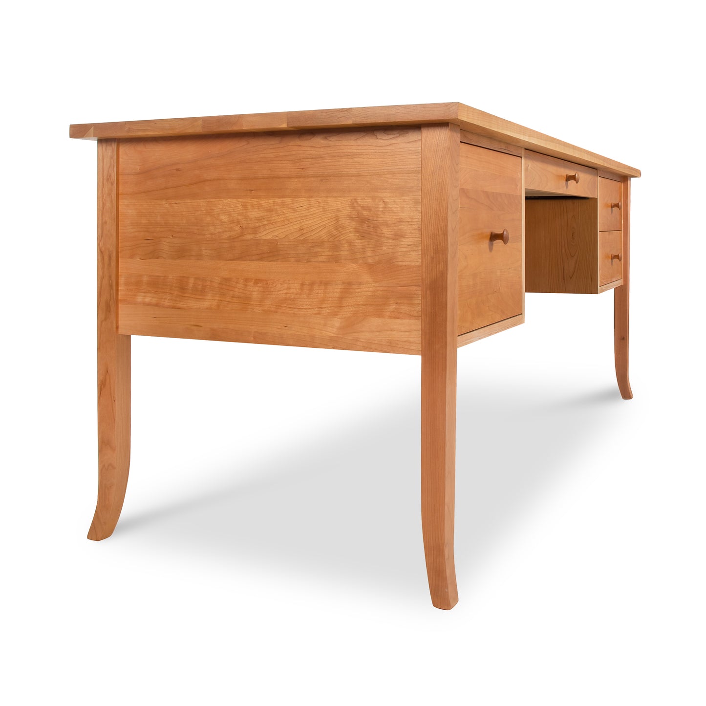 Lyndon Furniture Large Wood Flare Leg Executive Desk with three right-side drawers, highlighting its elegant flared legs and spacious design.
