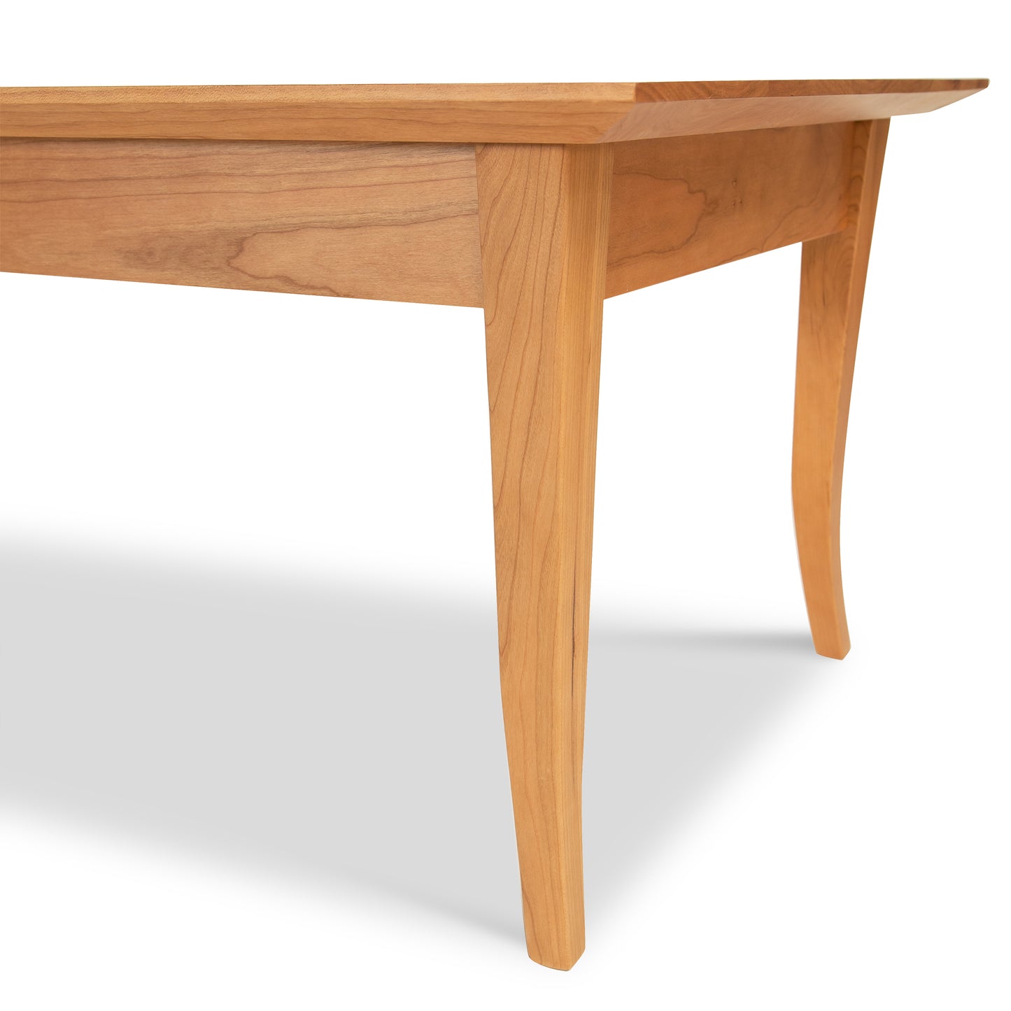 Lyndon Furniture Classic Shaker Flare Leg Coffee Table crafted from quality hardwoods, showcasing refined legs and a timeless shaker design.