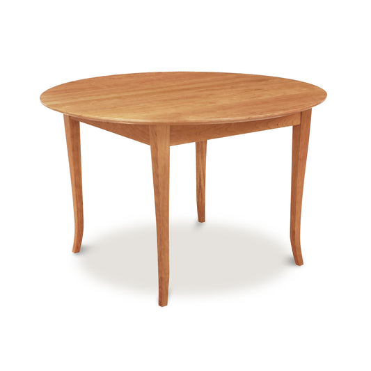 Lyndon Furniture Classic Shaker Flare Leg Round Solid Top Table crafted from solid hardwood, highlighting elegant flared legs and smooth round surface.