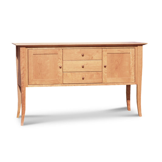 Lyndon Furniture Classic Shaker Flare Leg Small Buffet with three drawers, two doors, and curved hardwood legs, showcasing fine American craftsmanship.