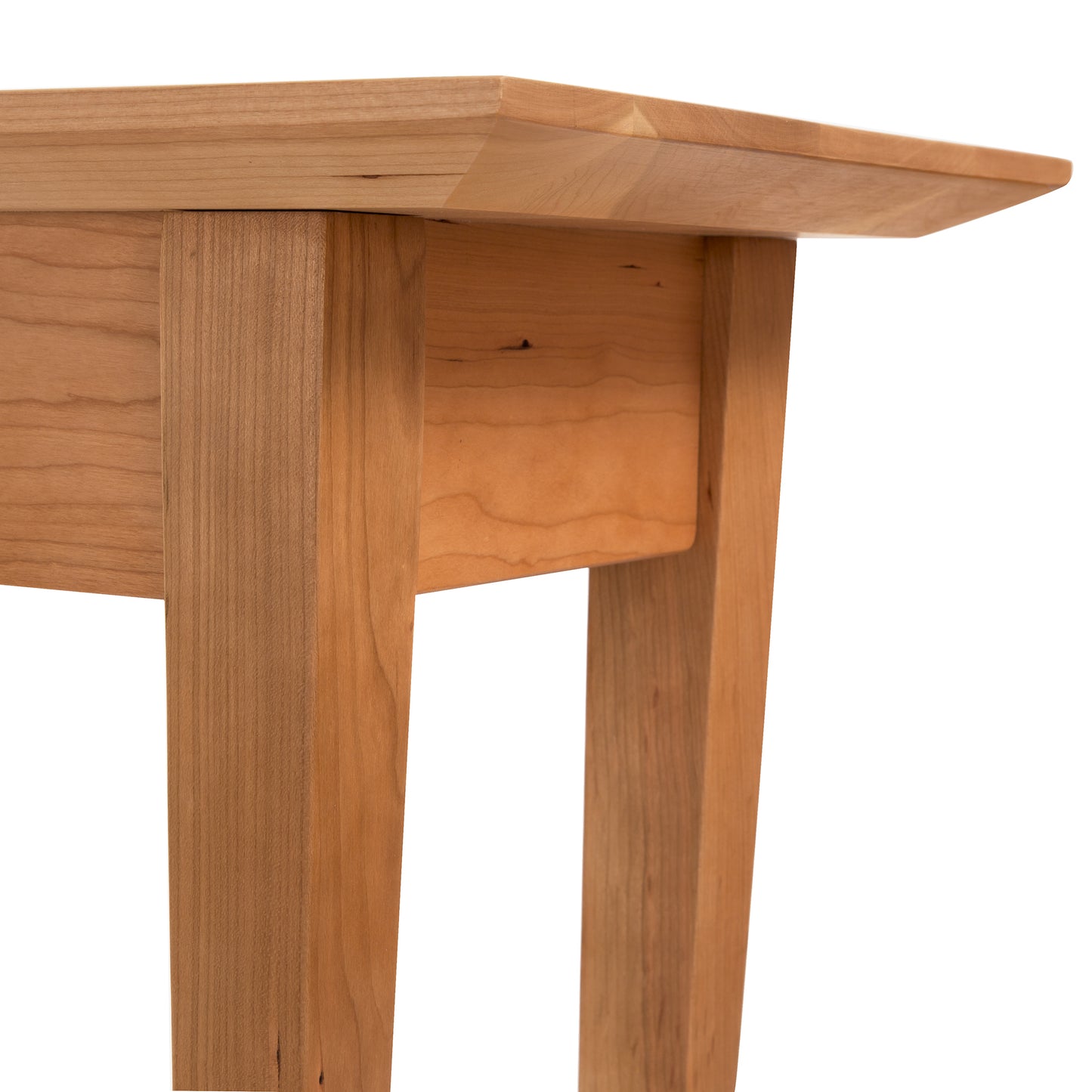 Classic Shaker Flare Leg Sofa Table by Lyndon Furniture featuring a beveled edge and detailed wood grain craftsmanship.