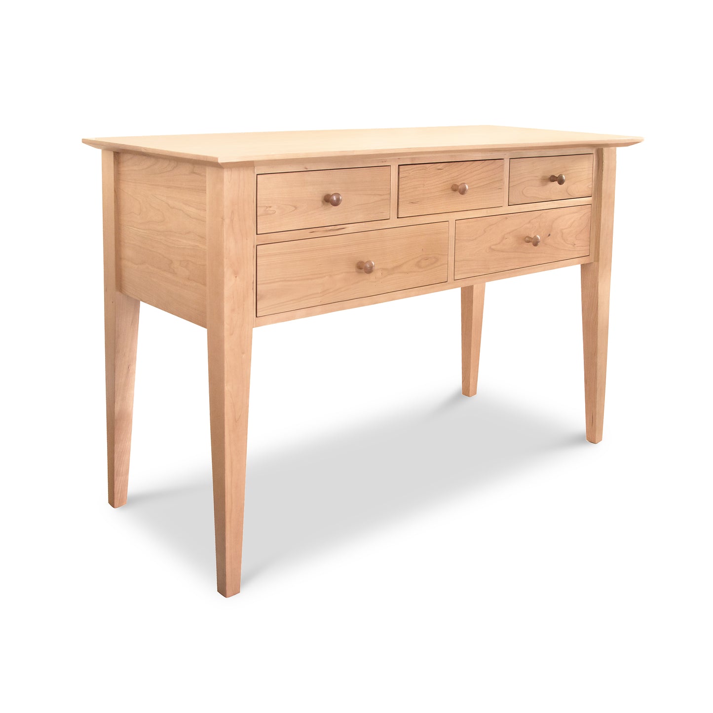 An eco-friendly Classic Shaker Hunt Board by Lyndon Furniture with drawers on it, featuring tapered legs.