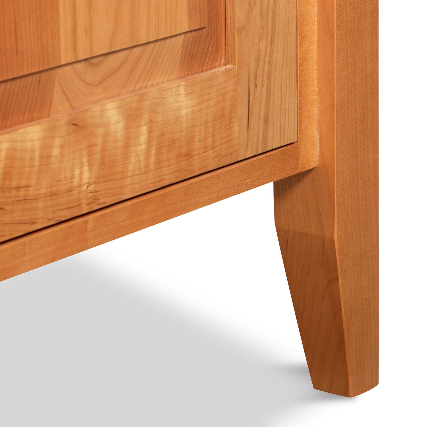 Classic Shaker Large Buffet by Lyndon Furniture, showcasing the intricate wood grain and distinctive angled legs crafted from sustainable hardwoods.