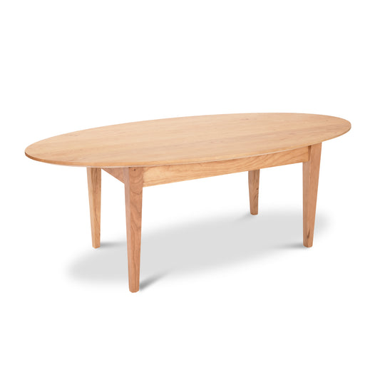 Lyndon Furniture Classic Shaker Oval Coffee Table crafted from sustainable wood, featuring a smooth oval top and four tapered legs.