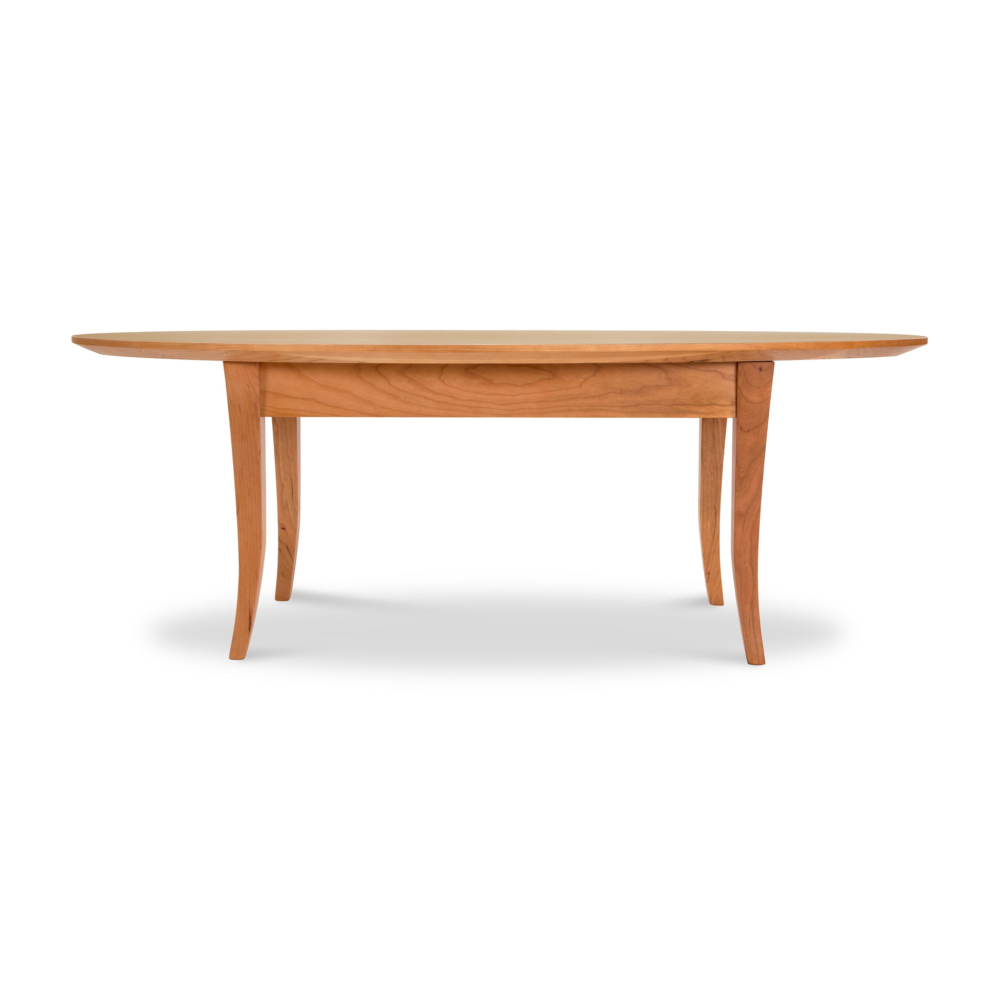 Classic Shaker Flare Leg Oval Top Coffee Table by Lyndon Furniture, crafted from sustainably sourced hardwoods in a natural finish.