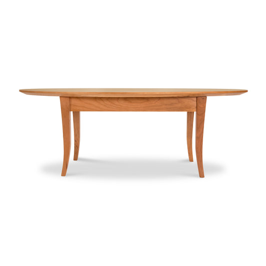 Classic Shaker Flare Leg Oval Top Coffee Table by Lyndon Furniture, crafted from sustainably sourced hardwoods in a natural finish.