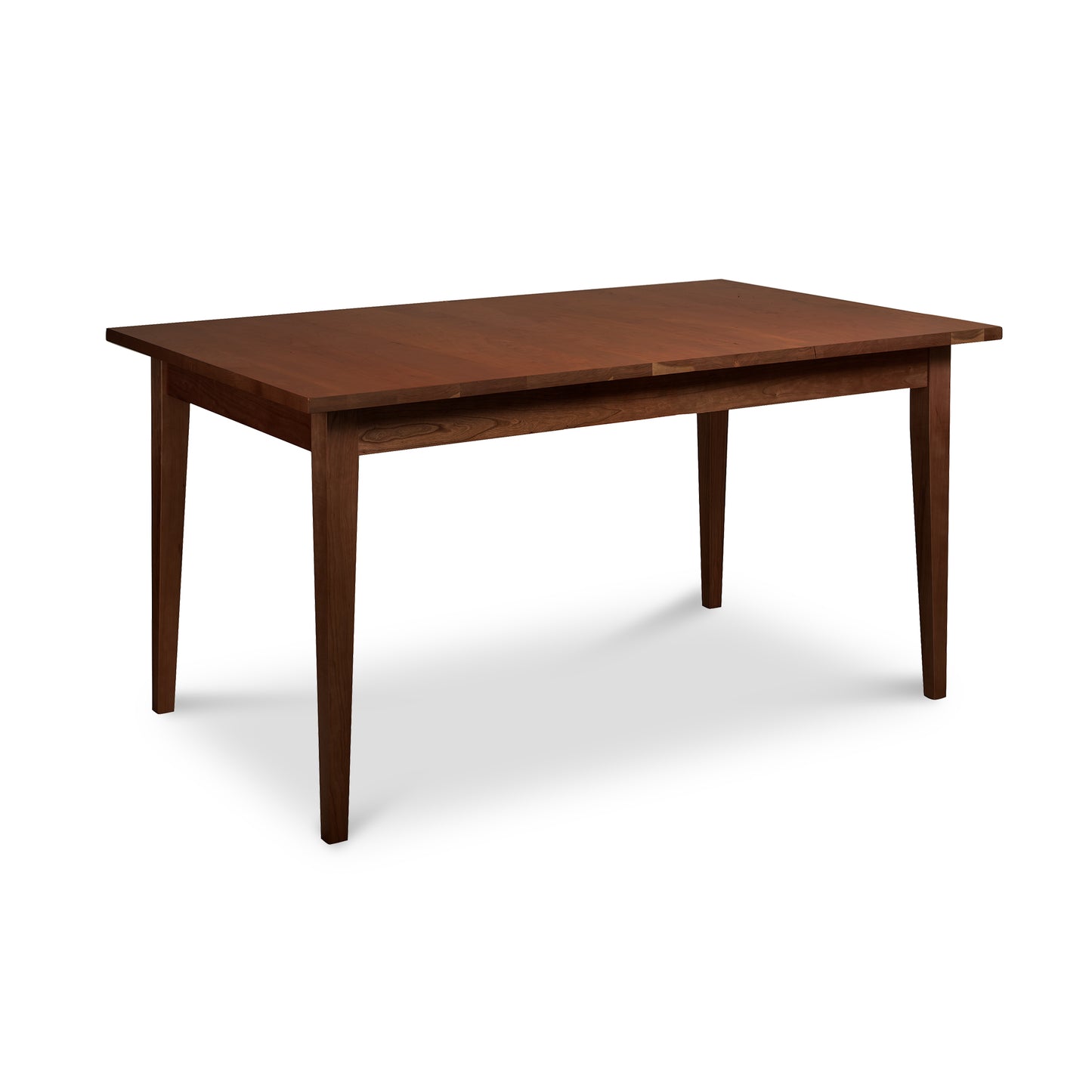 Lyndon Furniture Classic Shaker Solid Top Dining Table featuring a smooth dark brown solid wood surface and four straight legs, showcasing refined American craftsmanship.