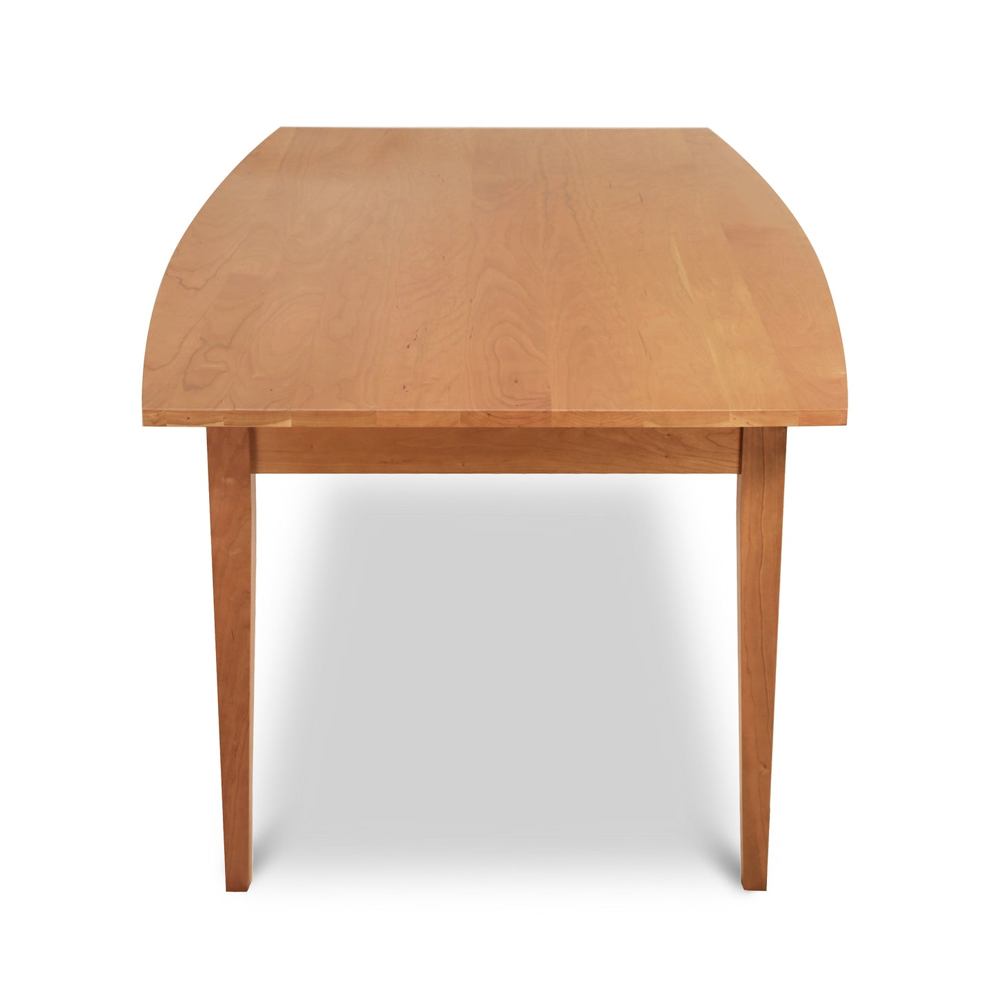 Lyndon Furniture Classic Shaker Solid Boat Top Table viewed from the short end, highlighting its elegant wood construction and timeless Shaker design.