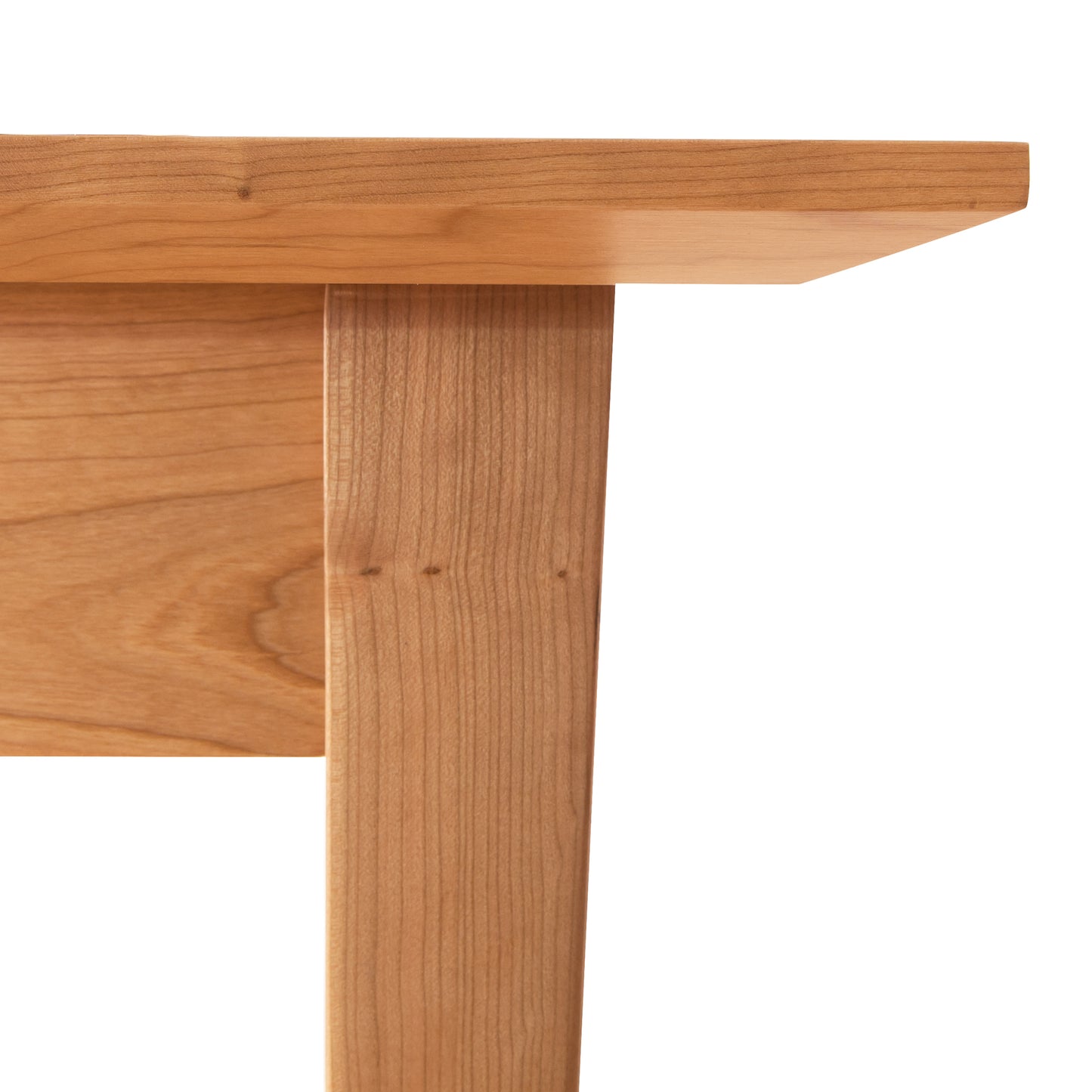 Lyndon Furniture Classic Shaker Flare Leg Square Solid Top Table in light brown hardwood, showcasing its elegant design and quality craftsmanship.