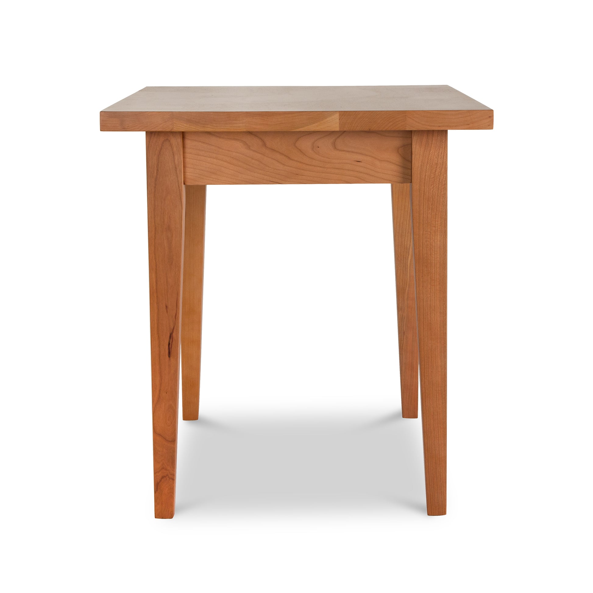 A Classic Shaker End Table from Lyndon Furniture, with a square top, is perfect for adding a touch of luxury and functionality to any space.
