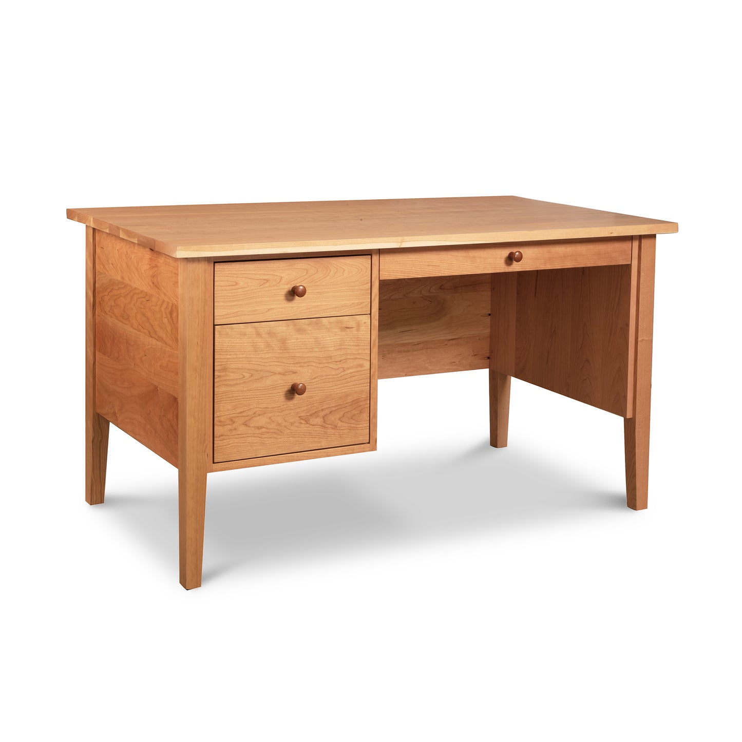Lyndon Furniture Small Wood Executive Desk in Shaker style, featuring two left drawers, a spacious top, and open right-side seating.