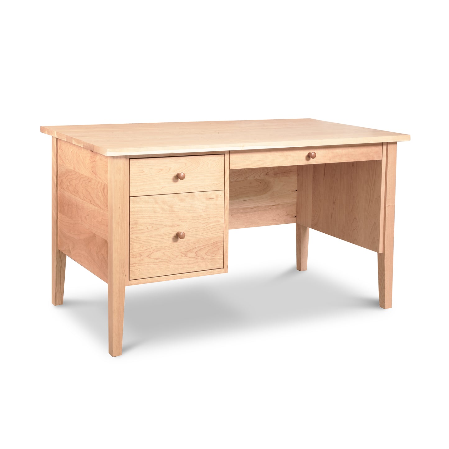 Lyndon Furniture Small Wood Executive Desk with two left drawers and open right seating, crafted in fine wood, made in America.