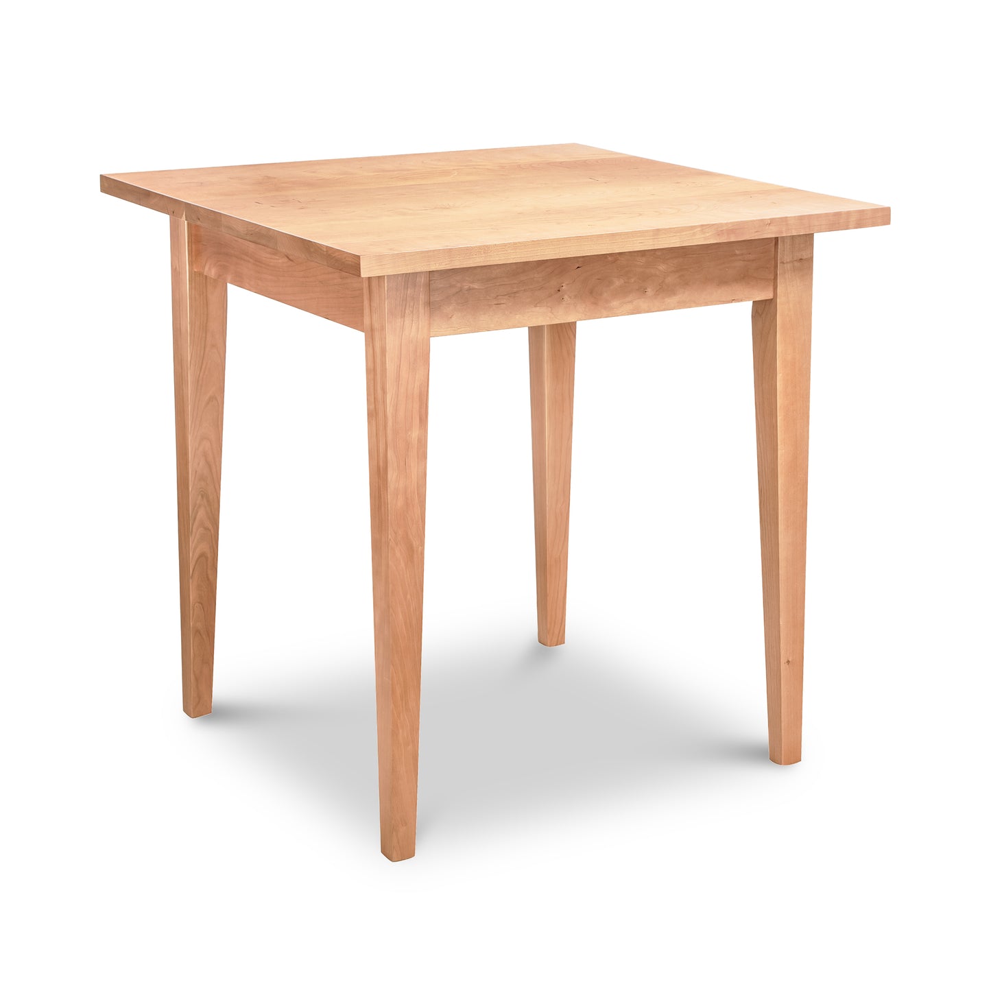 Lyndon Furniture Classic Shaker Square Dining Table with four straight legs and solid hardwood construction, showcasing timeless shaker design.