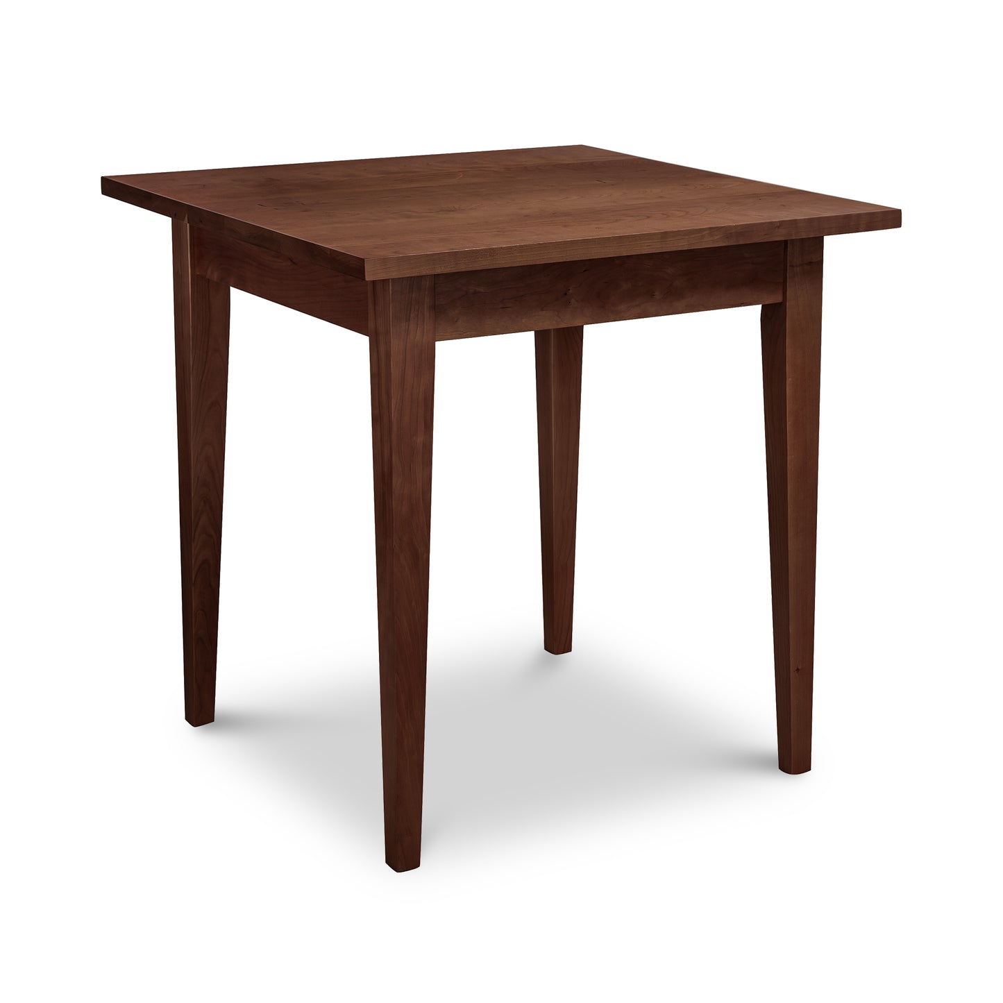 Lyndon Furniture Classic Shaker Square Dining Table made of solid hardwood with four straight legs, highlighting its timeless craftsmanship.