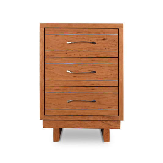 Vermont Furniture Designs Contemporary Cable 3-Drawer Nightstand in natural wood with silver handles, highlighting modern craftsmanship.