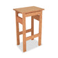 Handcrafted Maple Corner Woodworks contemporary Asian stool isolated on a white background.