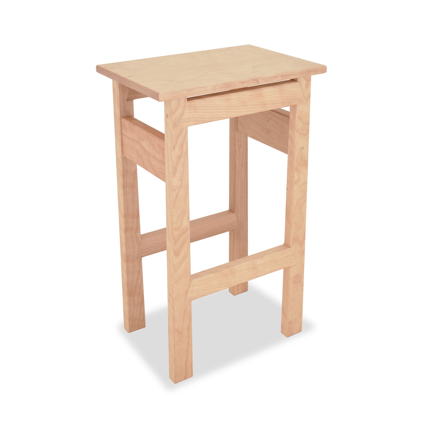 A simple eco-friendly Contemporary Asian Stool from Maple Corner Woodworks, isolated on a white background.