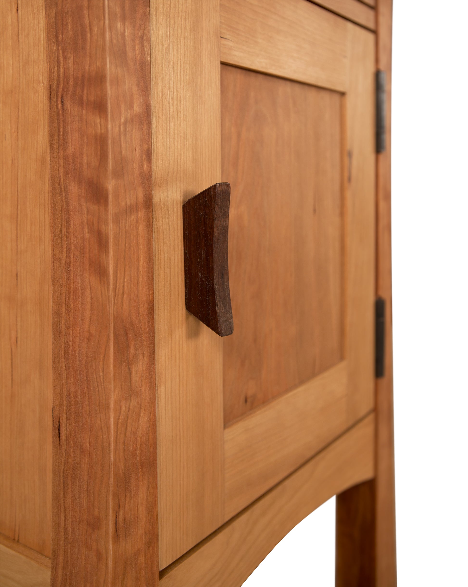 Vermont Furniture Designs Contemporary Craftsman 1-Drawer Nightstand with Door, showcasing rich wood grain, dark handle, and eco-friendly oil finish.