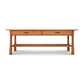 Contemporary Craftsman Console Coffee Table crafted from solid hardwoods with two drawers and a lower shelf, isolated on a white background and finished with an eco-friendly oil by Vermont Furniture Designs.
