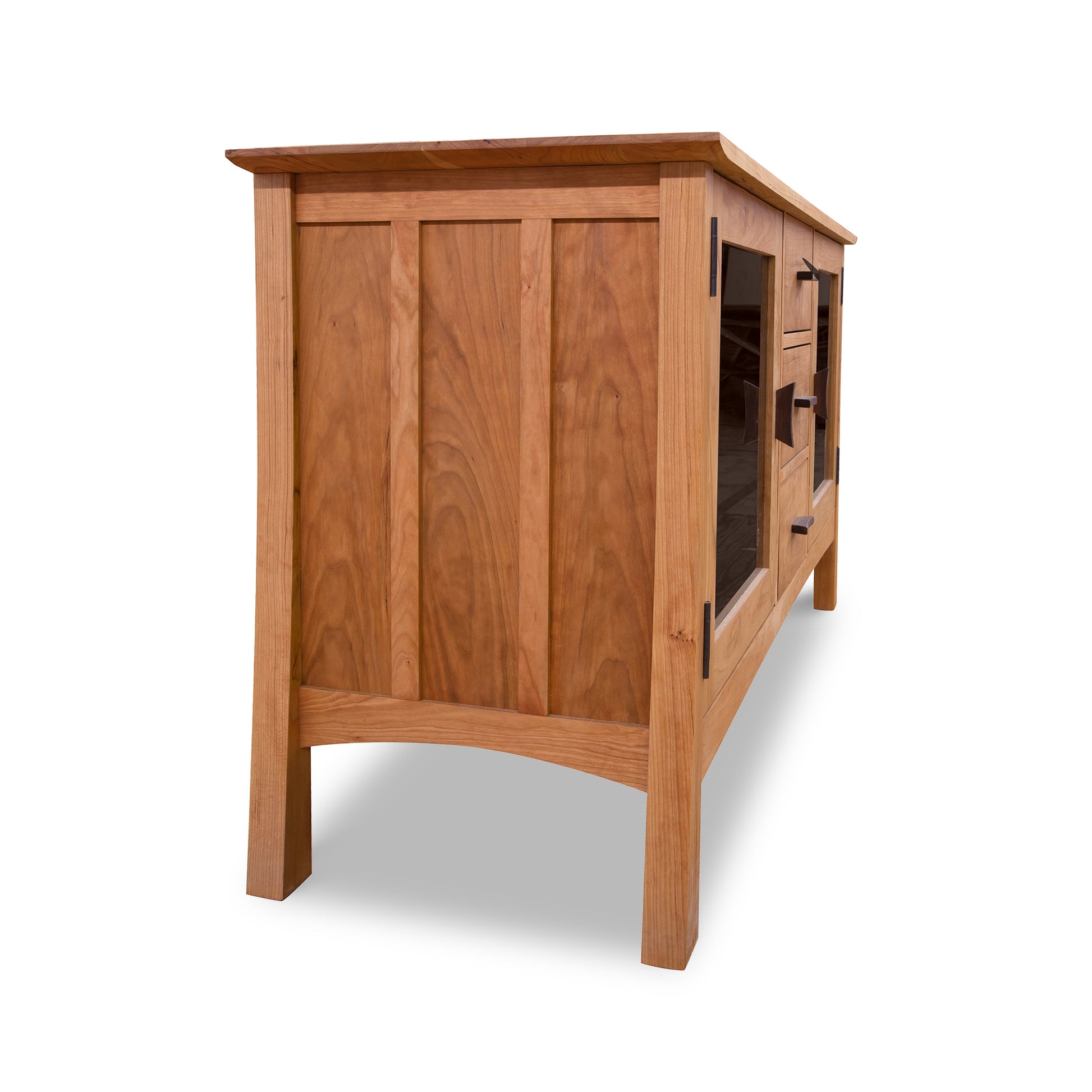 Vermont Furniture Designs Contemporary Craftsman 3-Drawer Media Console featuring glass doors and metal hinges, side profile view.