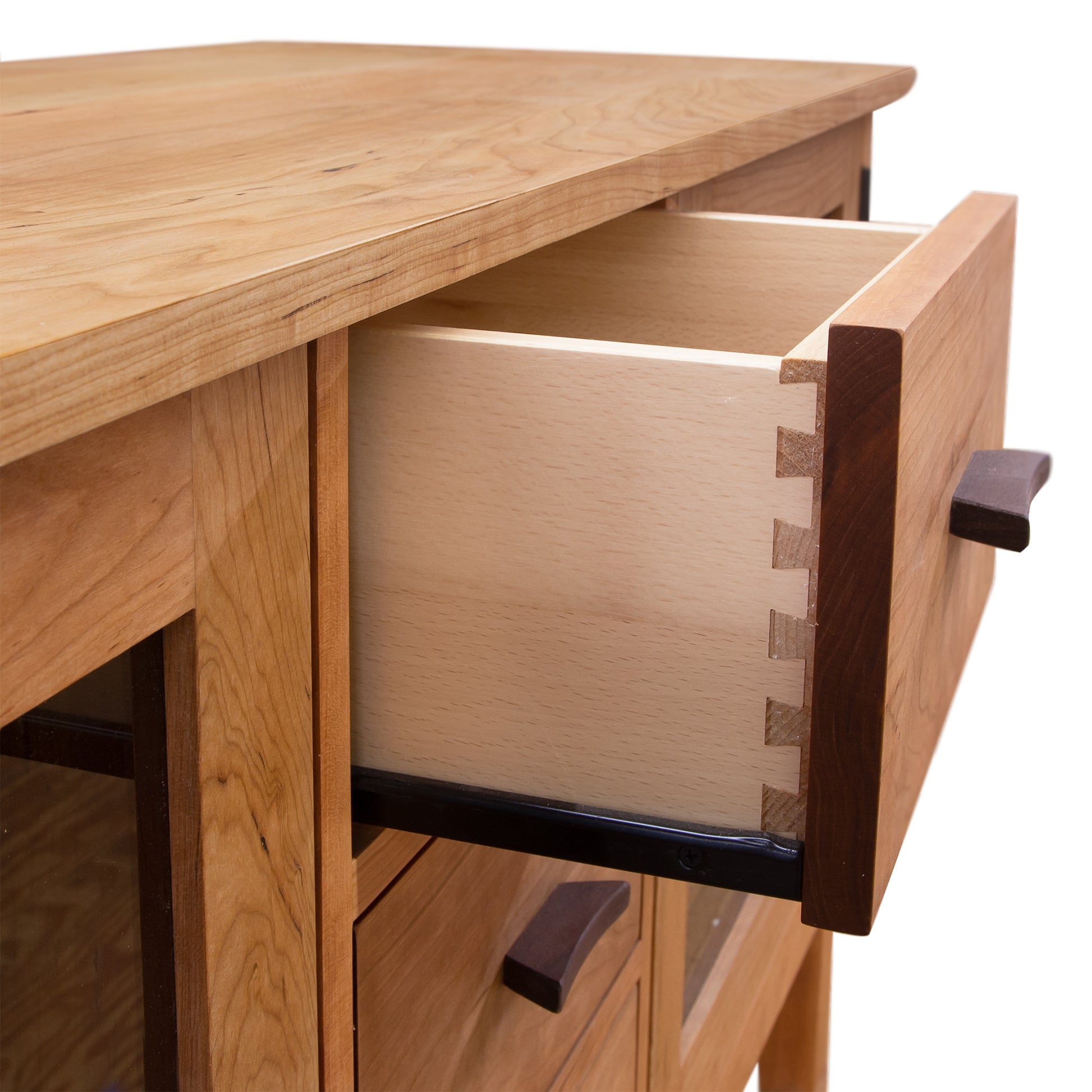 Contemporary Craftsman 3-Drawer Media Console by Vermont Furniture Designs, featuring an open drawer and sleek dark handles, highlighting its detailed craftsmanship.